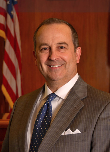 Robert M. Burns, Member